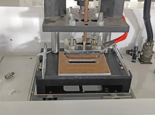 Heat sealing handle punch